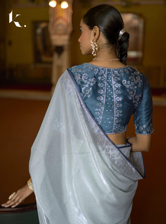 Peach Soft Tissue Silk Swarovski Work Saree With Contrast Swarovski Work Blouse.