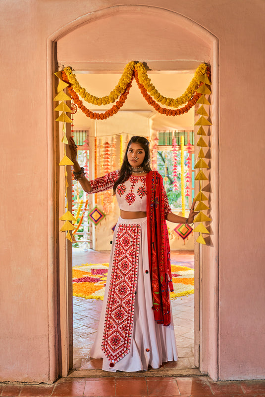 White Muslin Cotton Multi Color Thread Embroidered Lehenga Choli