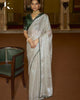 Beige Soft Tissue Silk Swarovski Work Saree With Contrast Swarovski Work Blouse.