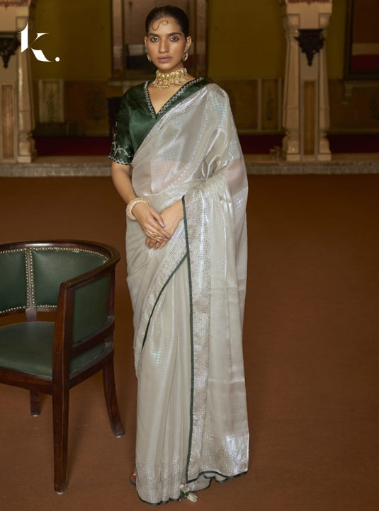 Beige Soft Tissue Silk Swarovski Work Saree With Contrast Swarovski Work Blouse.