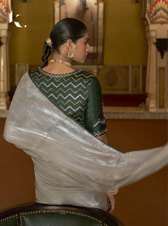 Beige Soft Tissue Silk Swarovski Work Saree With Contrast Swarovski Work Blouse.