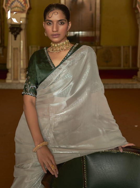 Beige Soft Tissue Silk Swarovski Work Saree With Contrast Swarovski Work Blouse.