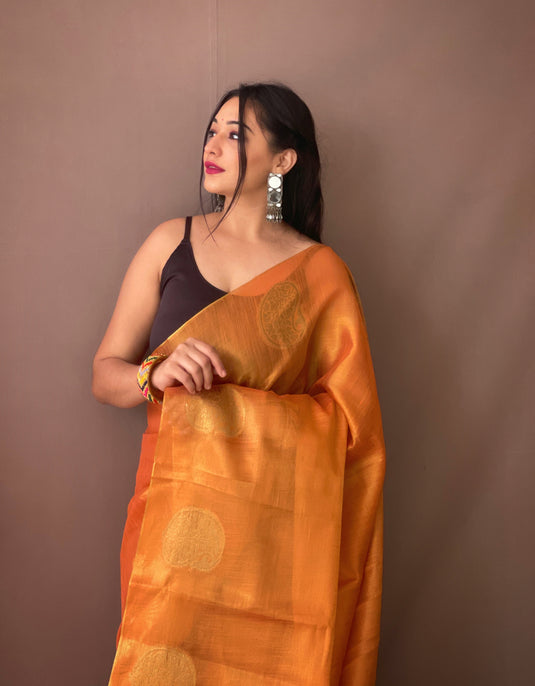 Orange Classic Tissue Silk Zari Weaving With Mango Border Saree