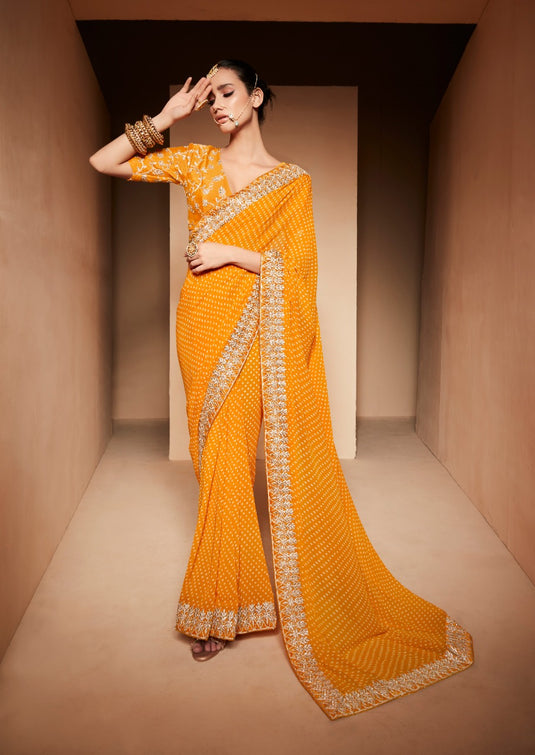 Mustard Yellow Heavy Georgette Traditional Printed Border Embroidered Saree