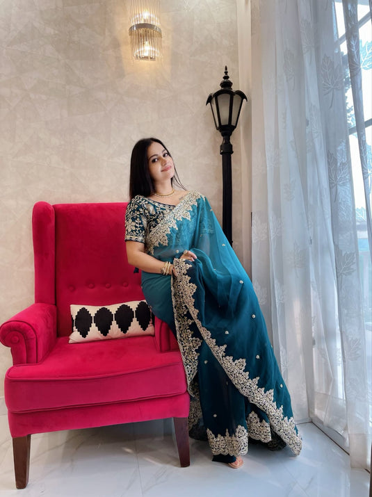 Teal Blue Pure Soft Georgette Silk Heavy Border Embroidered Saree