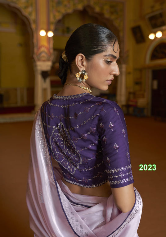 Lavender Soft Tissue Silk Swarovski Work Saree With Contrast Swarovski Work Blouse.