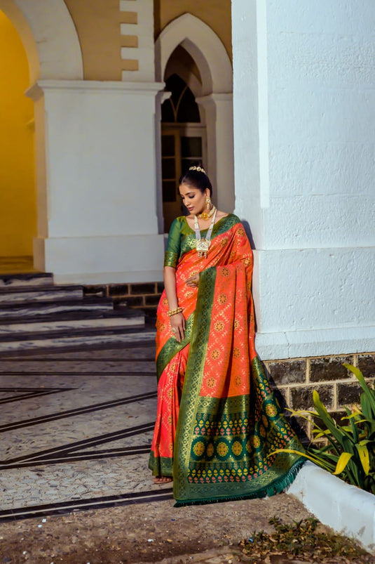 Orange Banarasi Soft Silk Patola Zari Weaving Pattern Saree