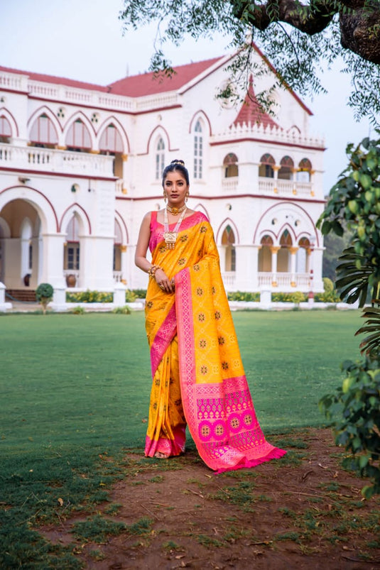 Yellow Banarasi Soft Silk Patola Zari Weaving Pattern Saree